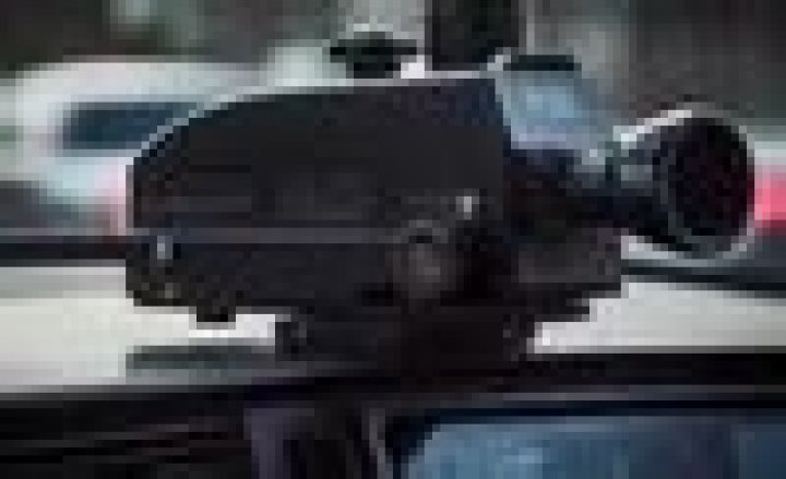 Can a moving police car clock your speed?