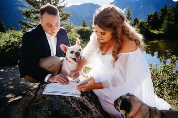 Can a pet be buried with a person?