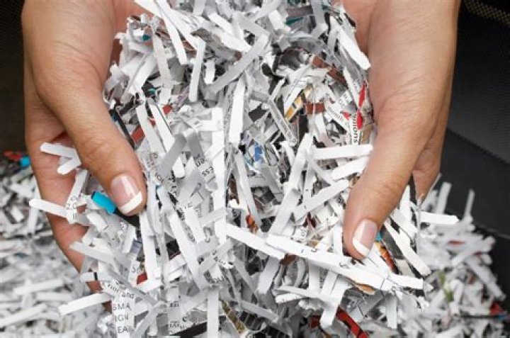 Can I put shredded paper in compost pile?