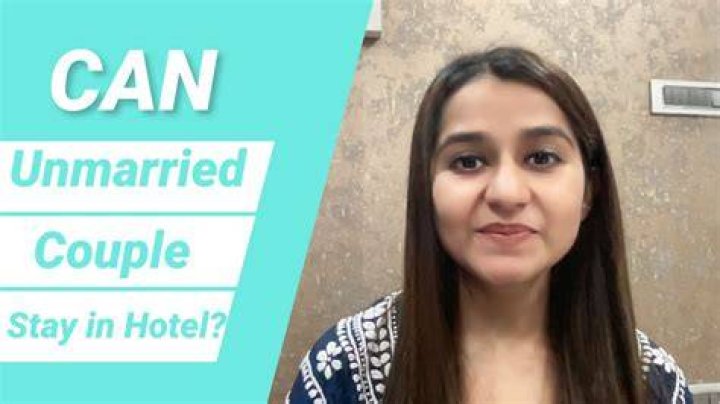 Can unmarried couples share a room in Qatar?