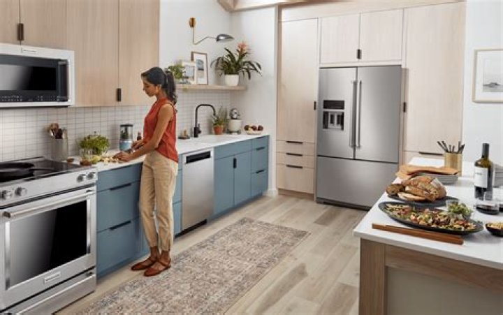 Can you put a fridge beside an oven?