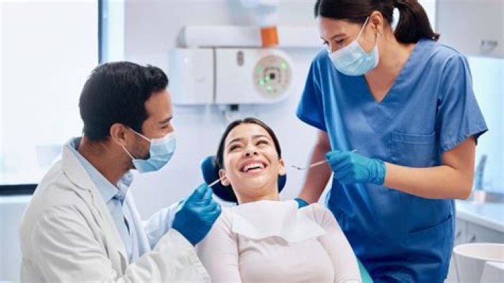 Do I see a doctor or dentist for tongue issues?