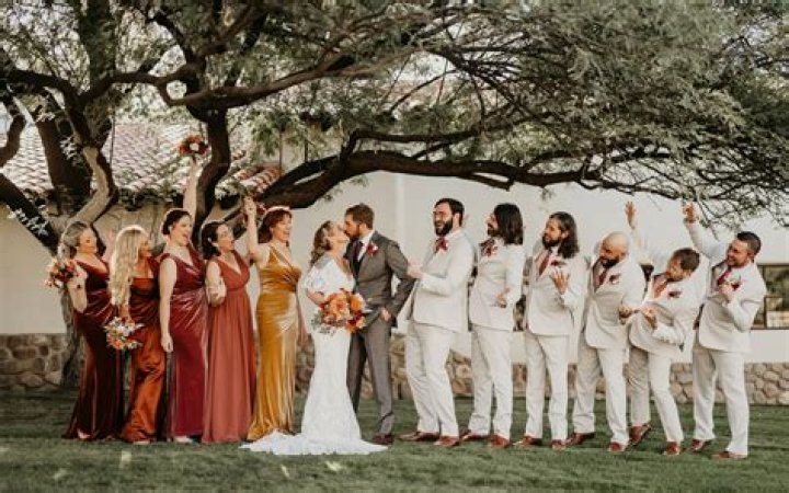 Do the bridesmaids and groomsmen walk together?