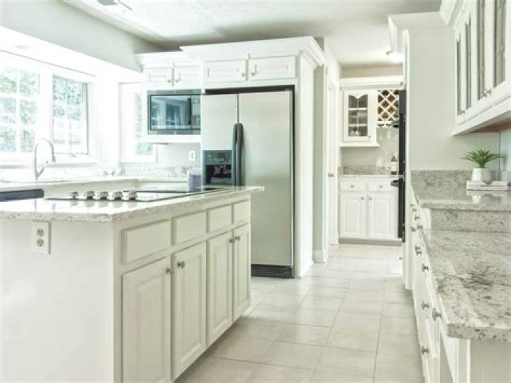 Do you put new flooring under kitchen appliances?