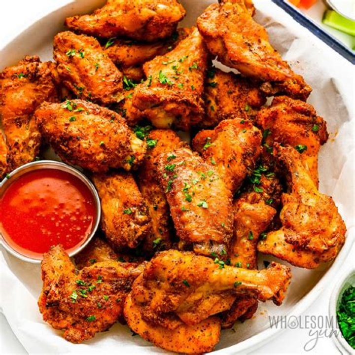 Do you put sauce on wings before or after air frying?