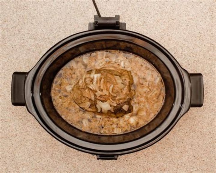 Do you put water in bottom of slow cooker?