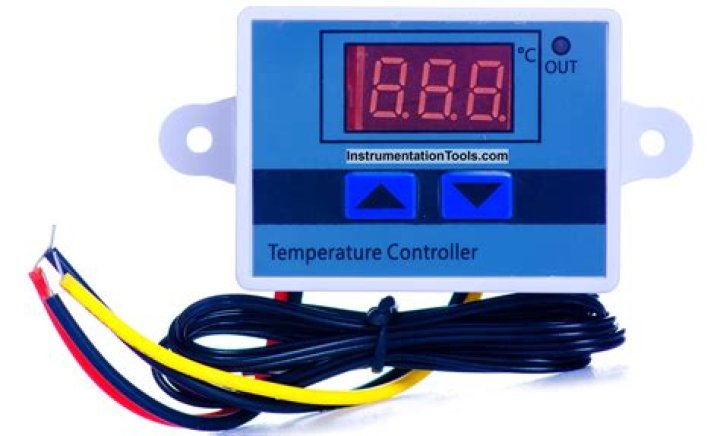 How do you control the temperature on a towel rail?