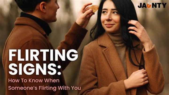 How do you describe a flirting smile?
