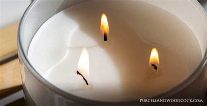 How do you get a three wick candle to burn evenly?