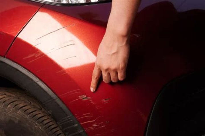 How do you remove scratches from shellac?