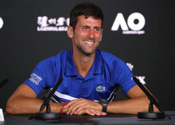 How many languages can Djokovic speak?