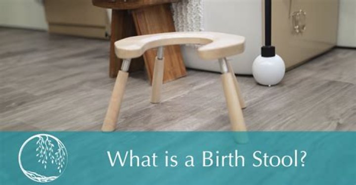 How was a birthing stool used?