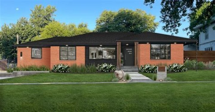 Is a brick house warmer than a wood house?