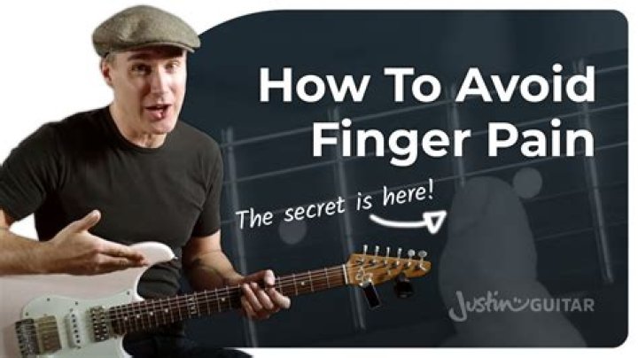 Should I stop playing guitar if my fingers hurt?