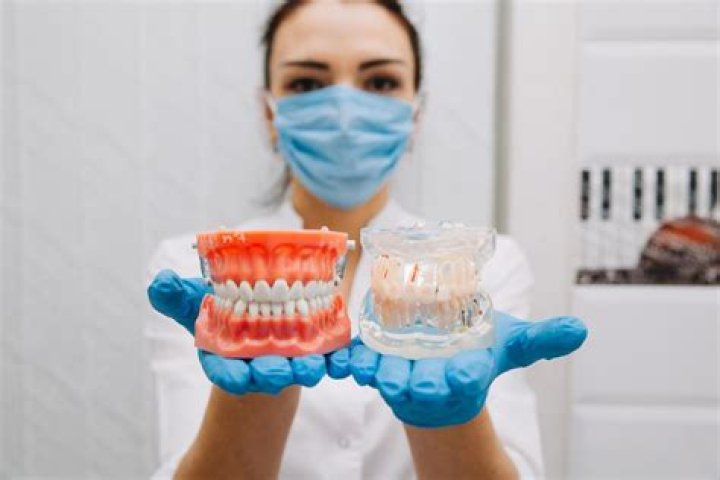 What are the pros and cons of false teeth?