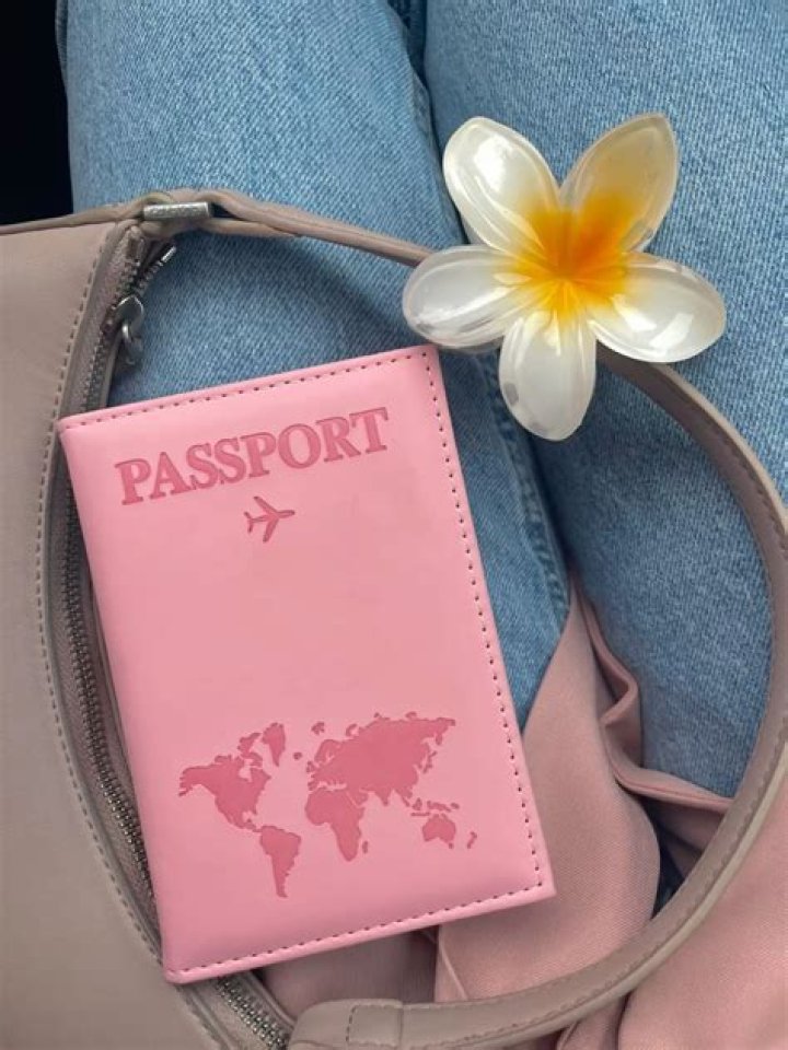 What country has a pink passport?