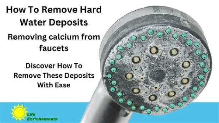 What dissolves hard water deposits?