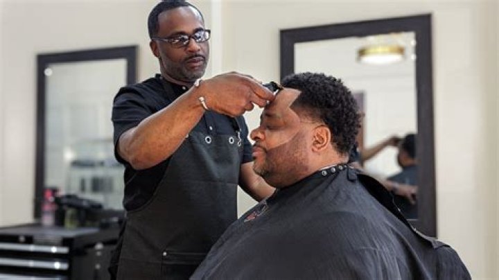 What do barbers cut hair with?