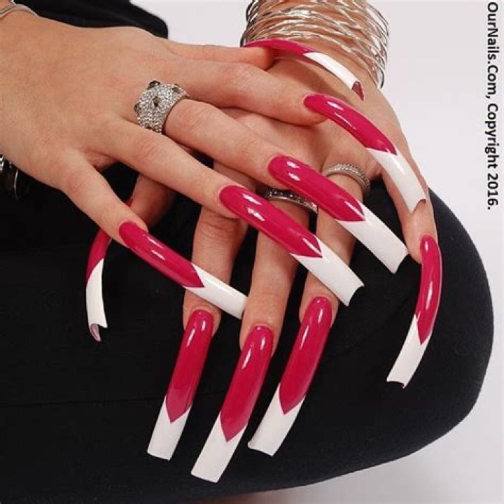 What do long nails say about a woman?