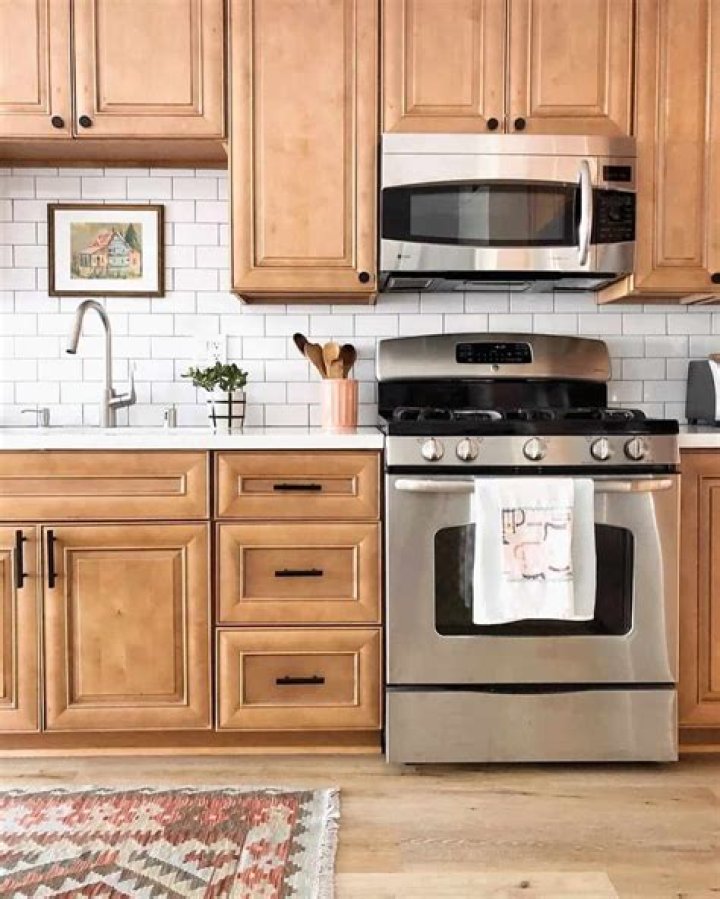 What do you wipe stainless steel appliances with?