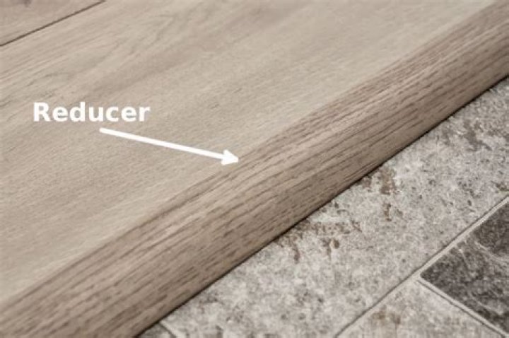 What is a floor reducer strip?