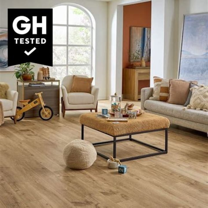 Where do you start laying vinyl plank flooring in a bedroom?