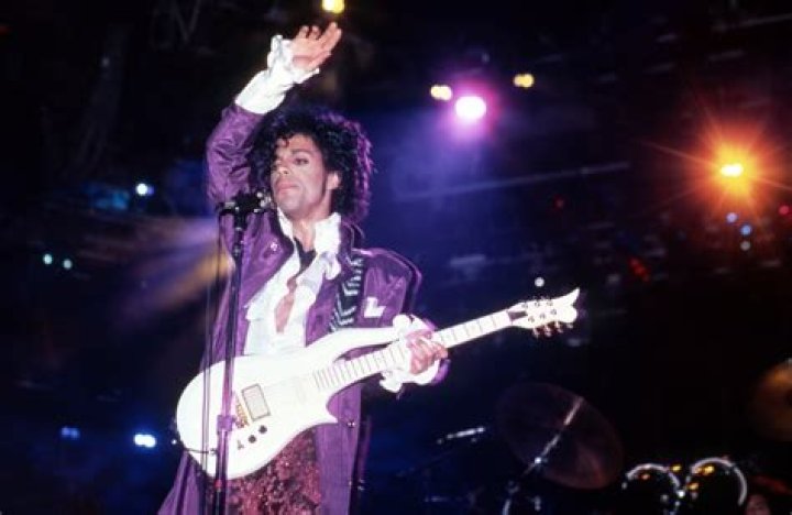 Who owns the masters to Purple Rain?