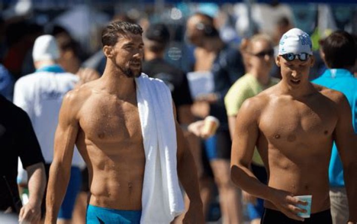 Why are swimmers shoulders so broad?