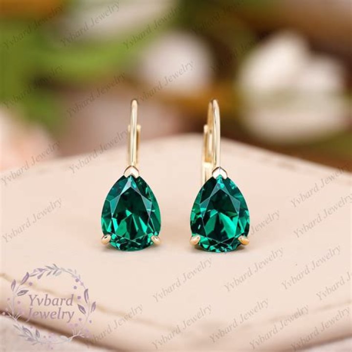 Why are the back of my earrings green?