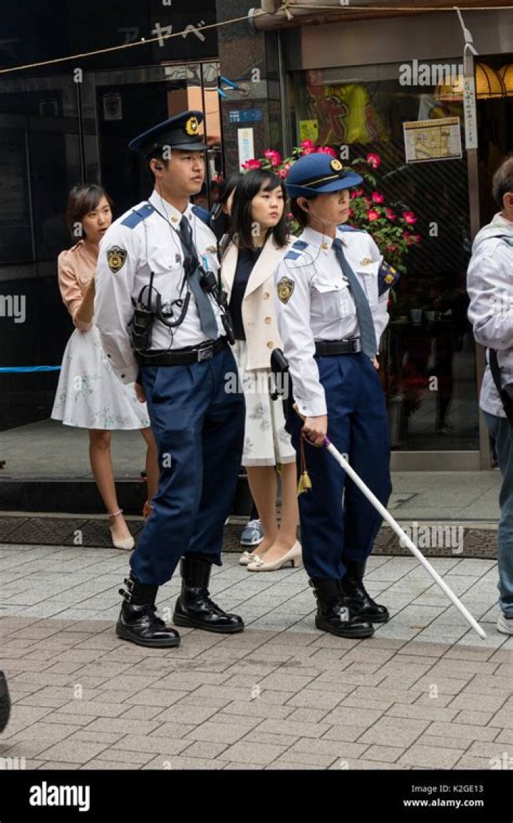Why do Japanese police wear white gloves?
