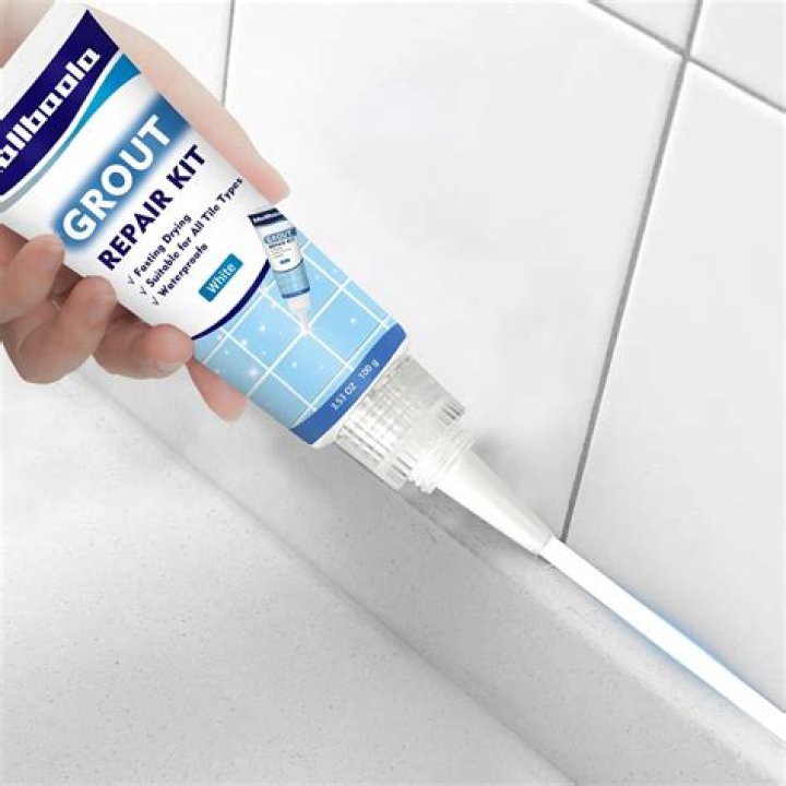 Why is the grout in my shower turning blue?