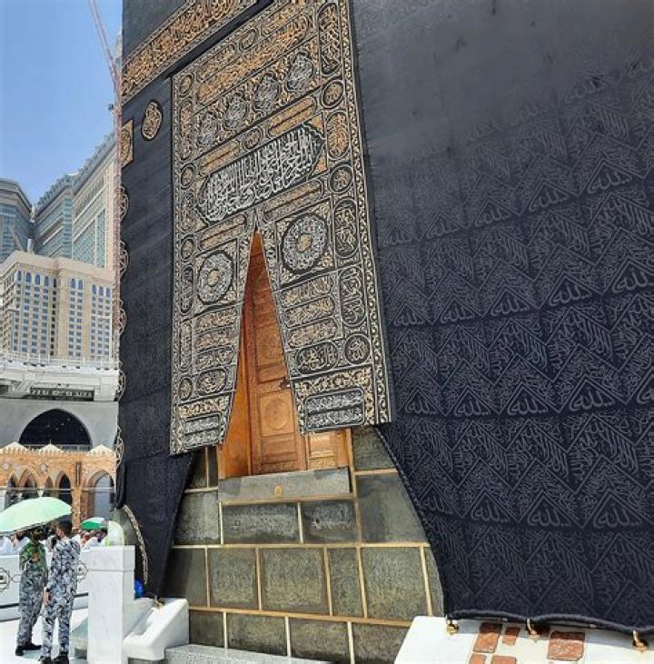 Why Kaaba is covered with black cloth?