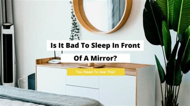Why shouldn't you sleep facing a mirror?